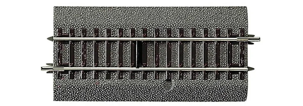 Switching track with potential-free switching contact, with bedding, length 115 mm