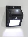 Solar wall light with infrared motion detector
