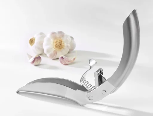 "Stainless steel garlic press image"