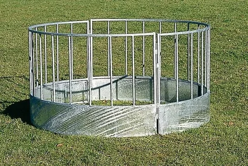 "Round hay rack for sheep - feeding trough for animals image"