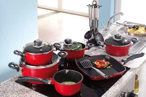 "Cast aluminum cookware set, 17-piece, red, including kitchen utensil set image"