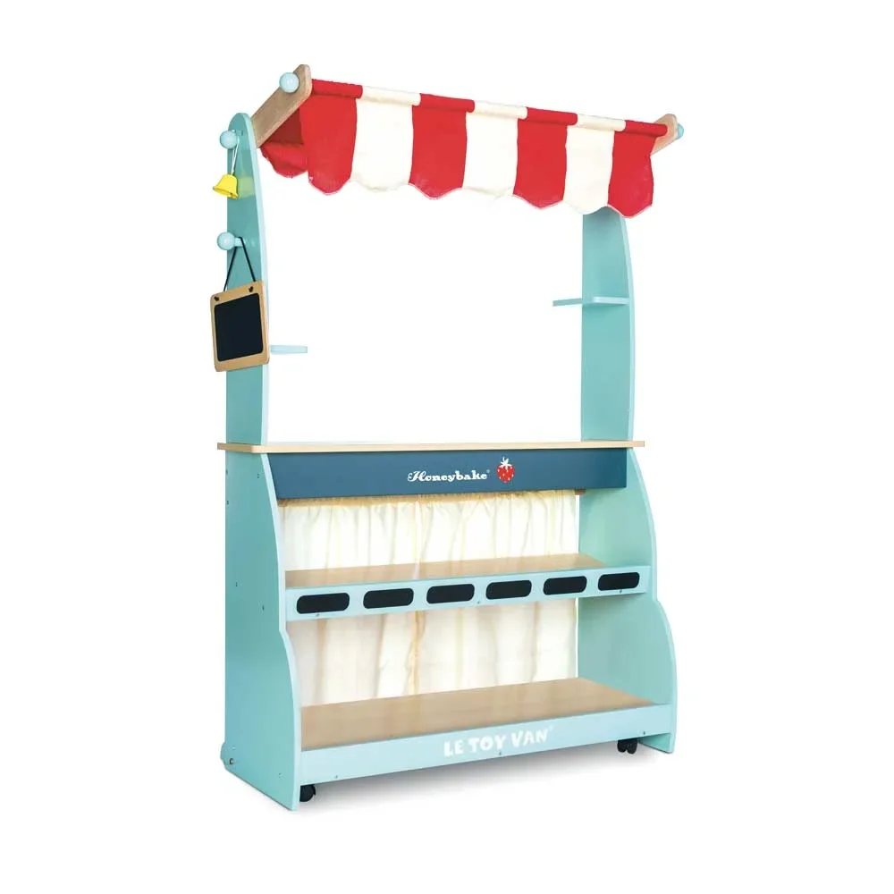 Le Toy van sales stand and Café Honeybake
