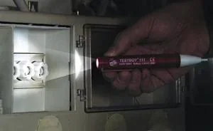 "Voltage tester 111 with optical & acoustic signal & light image"